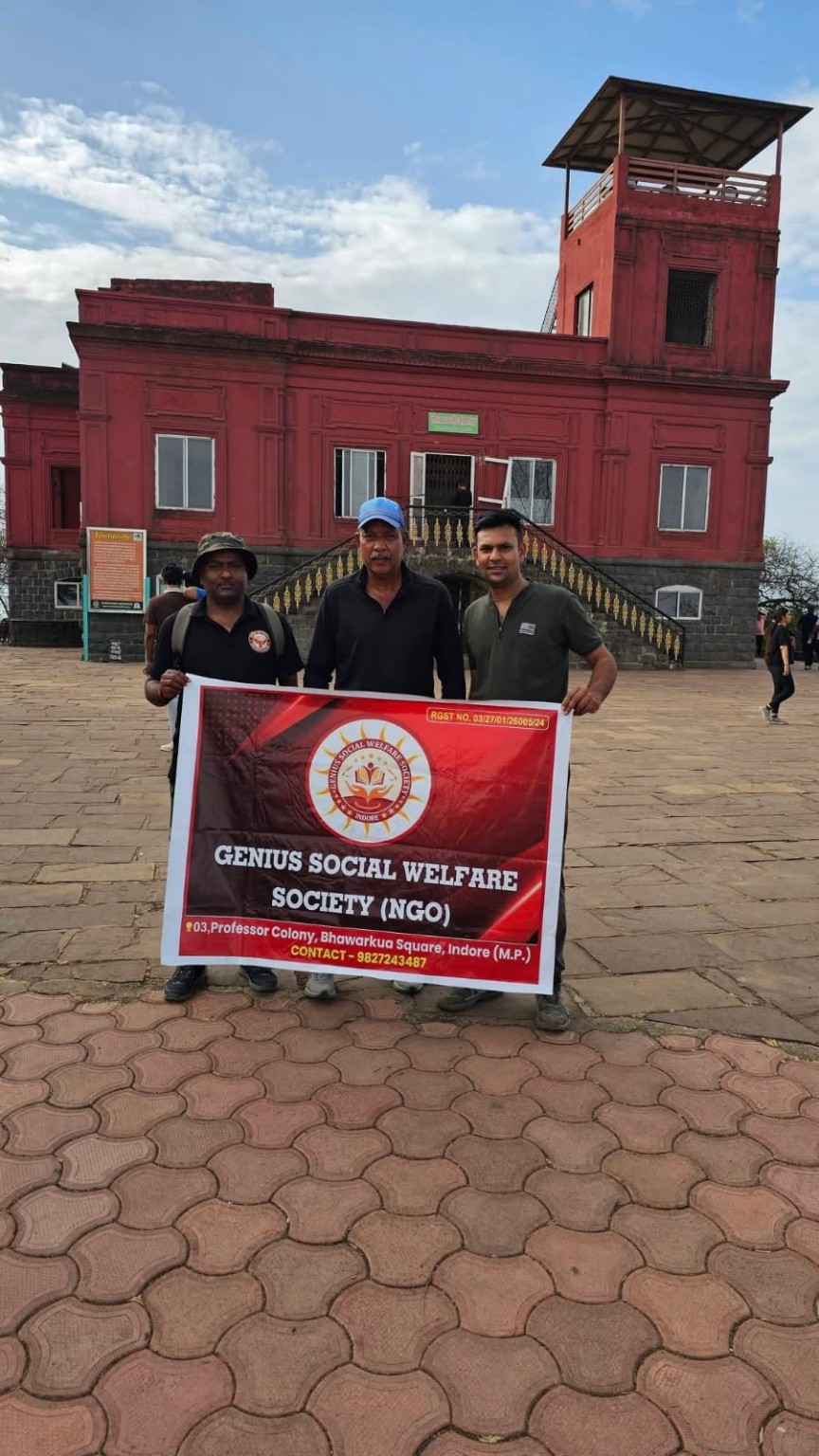 NGO field visit with team banner